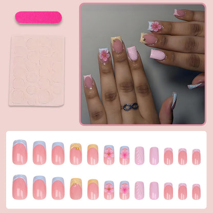 Kunstnagelset mit eleganten Blütenmotiven und farbenfrohen Designs Brehn