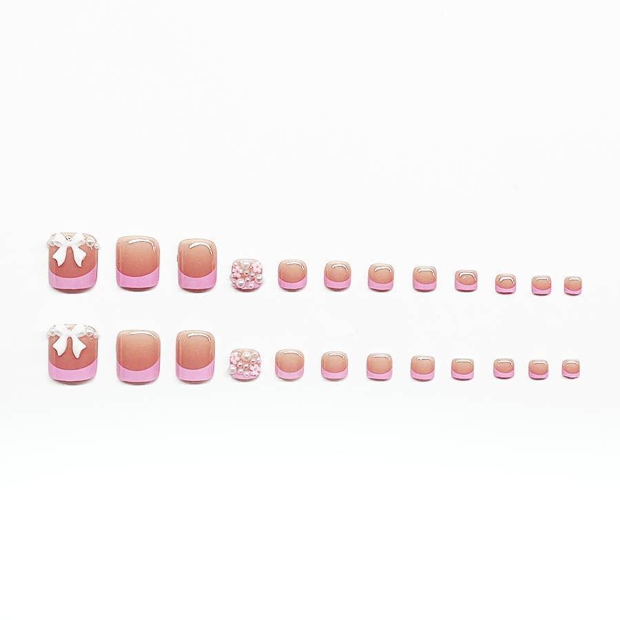 Dekorativer Press-On Nagelkunst Set mit floralen und Schleifenakzenten Brehn
