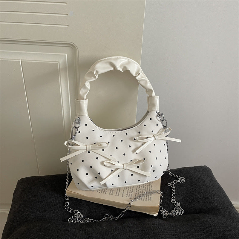 Stylische gepunktete Mini-Handtasche