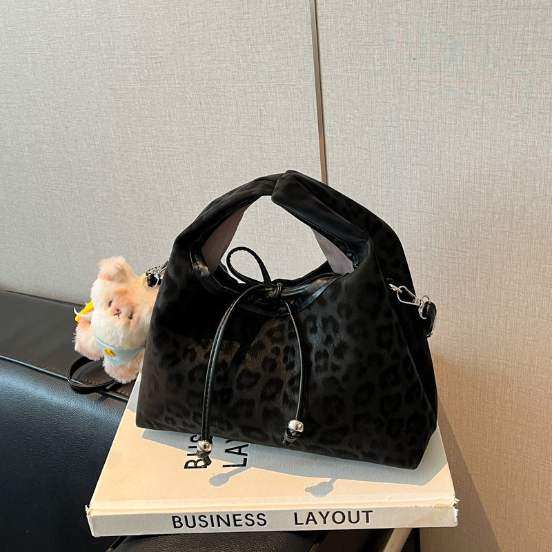 Stylische und funktionale Drawstring-Handtasche Brehn