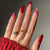 Kunstnagelset mit elegantem Kuss-Motiv und glamourösem Finish Brehn