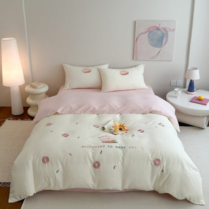 Baumwoll-Bettwäsche-Set mit gesticktem Donut-Motiv und Kissenbezügen Brehn