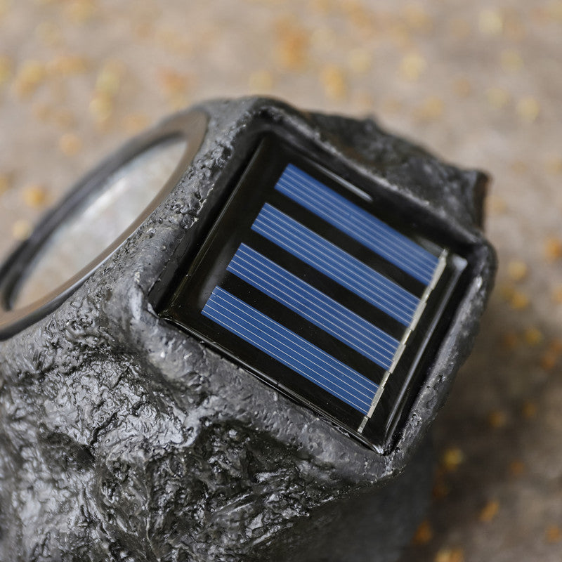 Solarbetriebene LED-Faux-Rock-Gartenstrahler mit integriertem Solarpanel und wetterfestem strukturiertem Har Gehäuse Brehn
