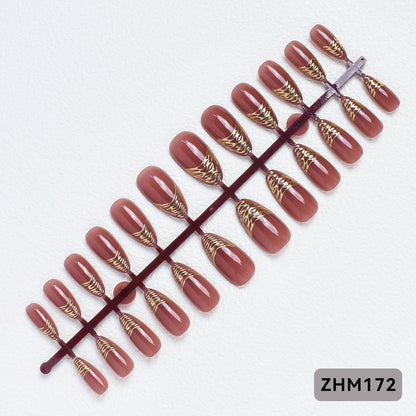 Elegante Press-On Nagelspitzen mit goldenen Details Brehn