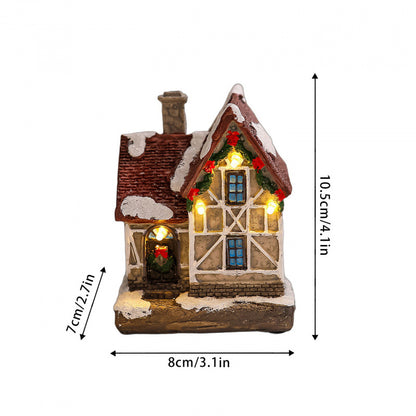 Dekoratives Weihnachtsdorf mit Lichtern Brehn