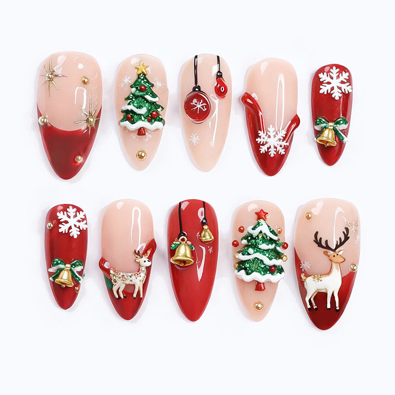 Kunstnagelset mit festlichen Weihnachtsmotiven und funkelnden Akzenten Brehn