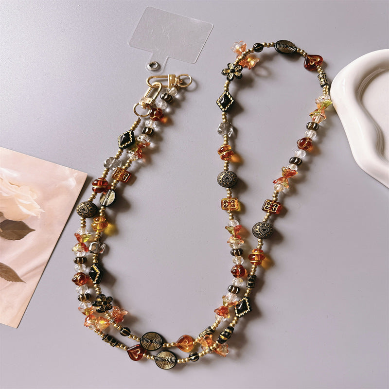 Blumige Perlen-Charm-Schlüsselanhänger Brehn