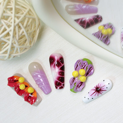 Kreatives Kunstnagelset mit bunten 3D-Verzierungen Brehn