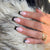 Elegante Stiletto-Nägel mit kontrastierendem French-Tip Brehn