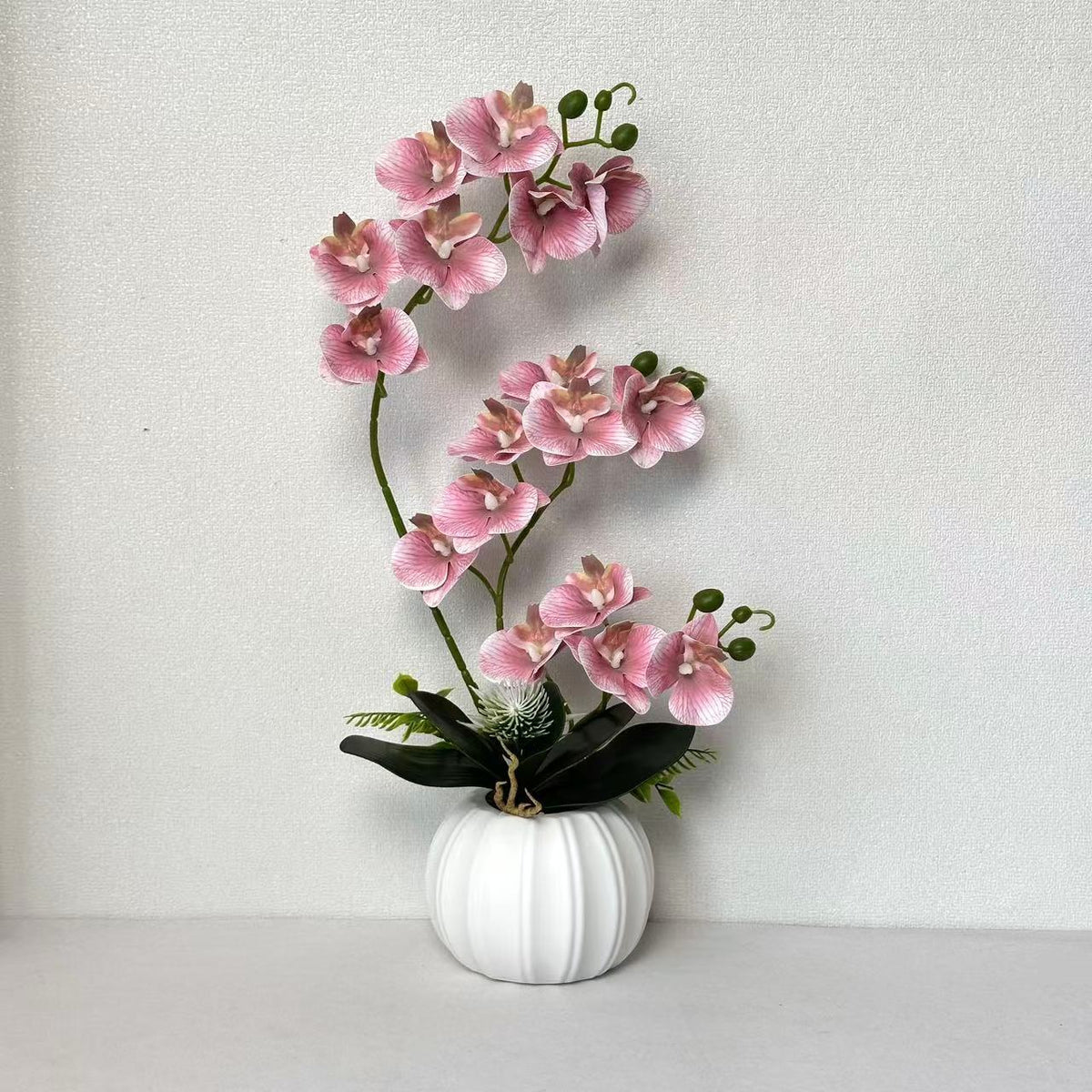 Elegante künstliche Orchideenblütenarrangement