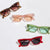 Damen geometrische Sonnenbrille mit stylischem Kunststoffrahmen Brehn