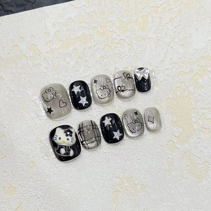 Spaß und verspieltes Press-On Nail Set mit Cartoon-Accents Brehn