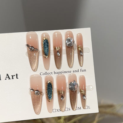 Dekoratives Press-On Nagelkunstset mit Edelsteinverzierungen