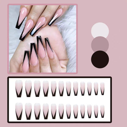 Kunstnagelset mit elegantem Stiletto-Design und glänzenden Akzenten Brehn