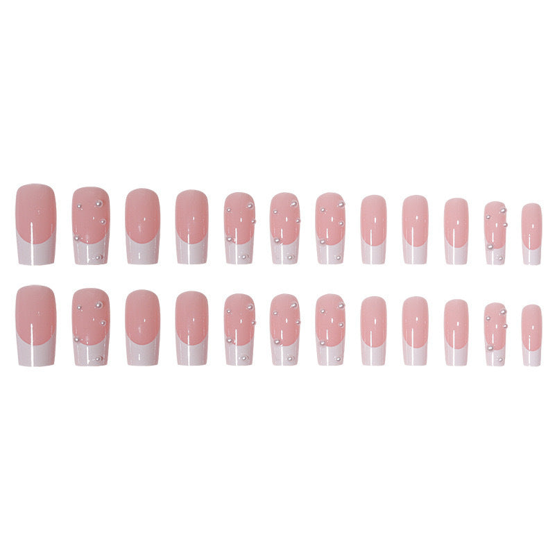 Kunstnagelset mit exquisiten Perlenakzenten und transparentem Design Brehn