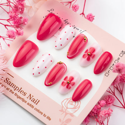 Künstlerisches Press-On-Nagelset mit Blumen- und Punktdesigns