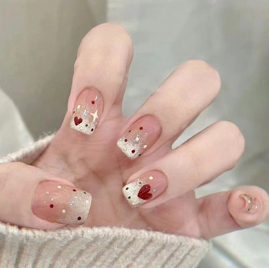 Künstlerisches Press-On-Nagel-Set mit floralen und Edelsteinakzenten Brehn