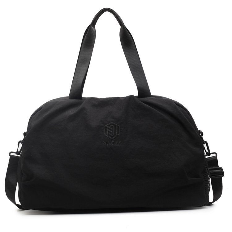 Kompakte Reis-Handtasche