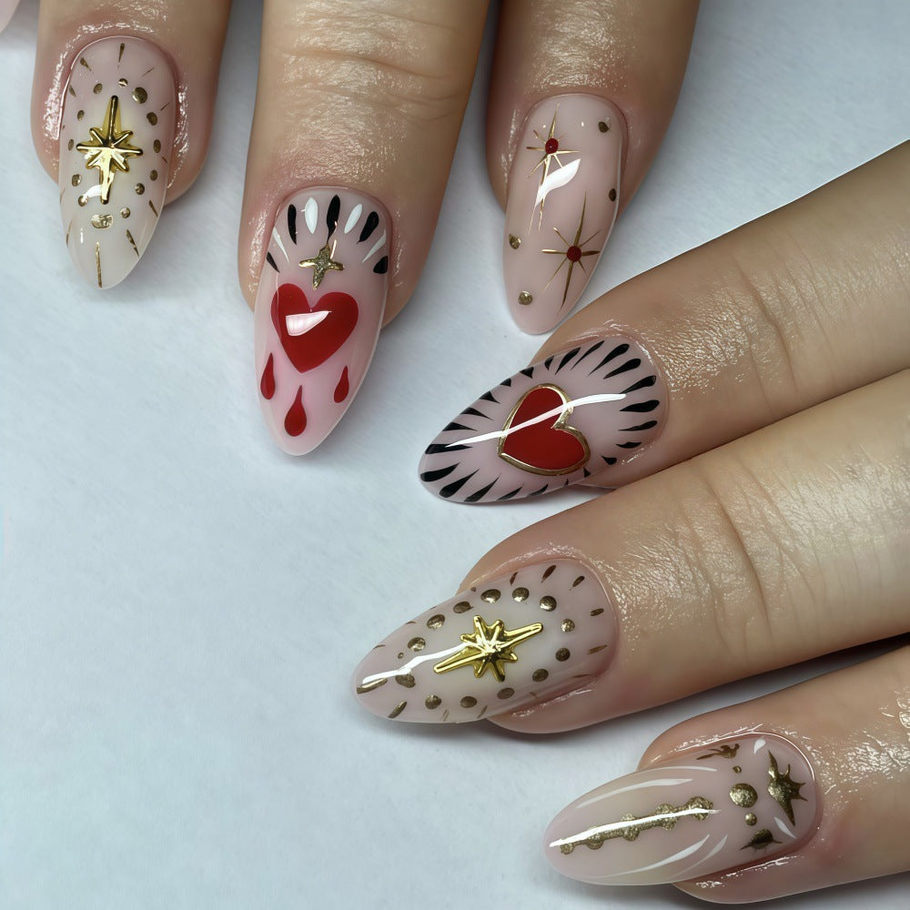 Kunstnägel mit Glitzer- und Herzenverzierung Brehn