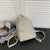 Kompakte Sling-Rucksack