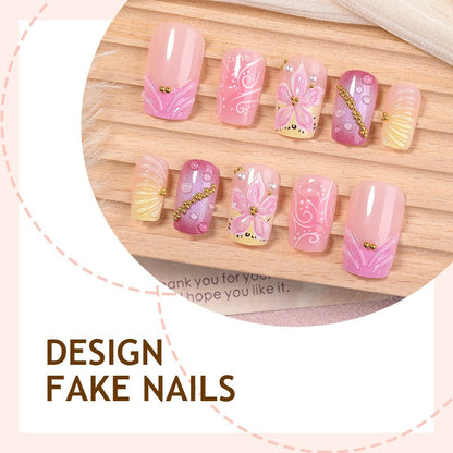 Künstliche Nagelkollektion mit floralem Design und Glitzerakzenten Brehn