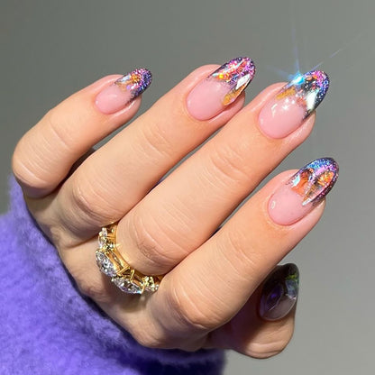 Kunstvolle Gel-Nägel mit Glitzer- und Strassakzenten Brehn