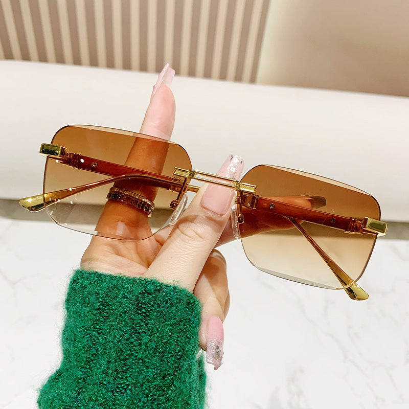 Damen modische rechteckige Sonnenbrille mit edlem Metallakzent Brehn