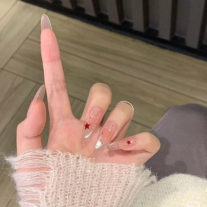 Elegante mit Sternen verzierte Nagelverlängerungen Brehn
