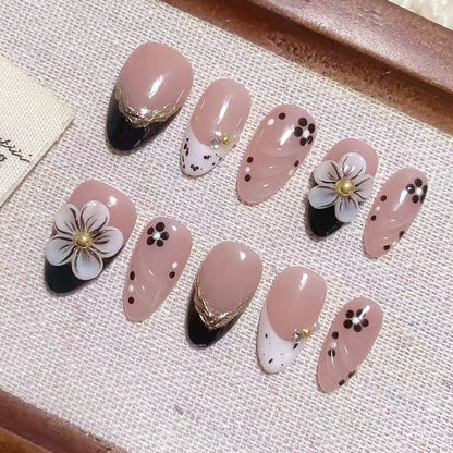 Dekorative, florale und mit Edelsteinen verzierte Press-On-Nägel Brehn