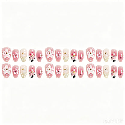 Kunstnagelset mit eleganten Blütenakzenten Brehn