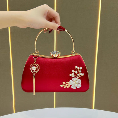 Elegante florale verzierte Handtasche