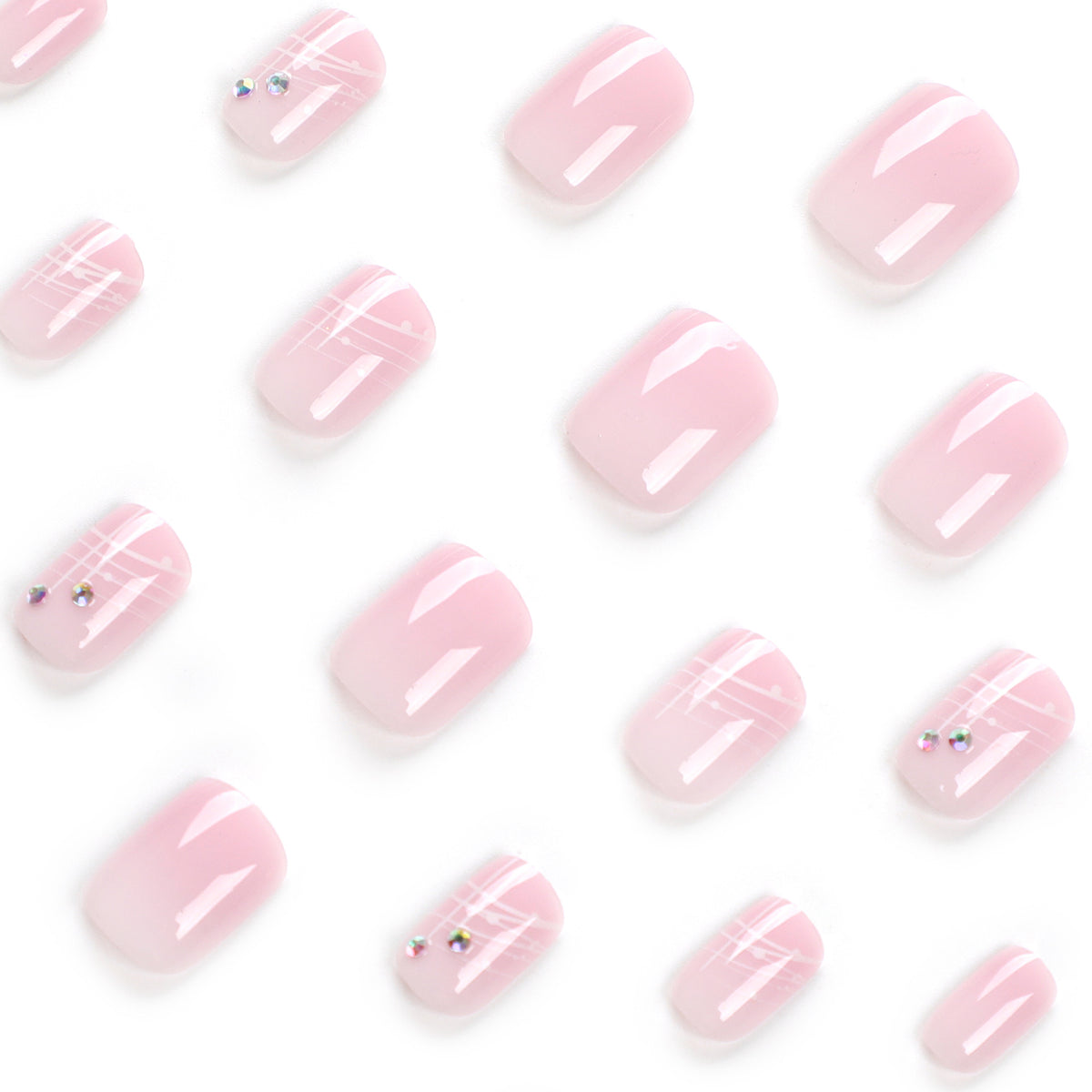 Kunstvolle Nagelverlängerungen mit elegantem Design und Strassverzierungen Brehn