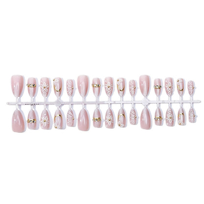 Elegantes Kunstnagelset mit Blumen- und Glitzerelementen Brehn