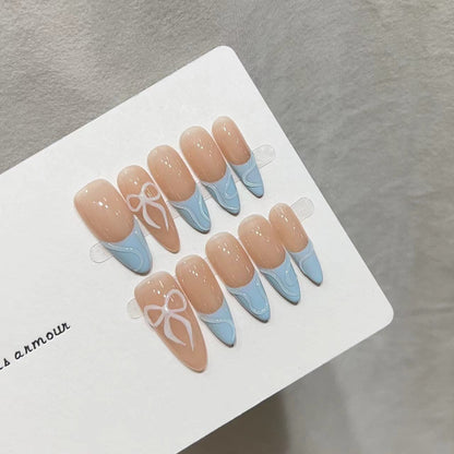 Dekoratives Press-On-Nagelkunst-Set mit charmantem Schleifen-Design Brehn
