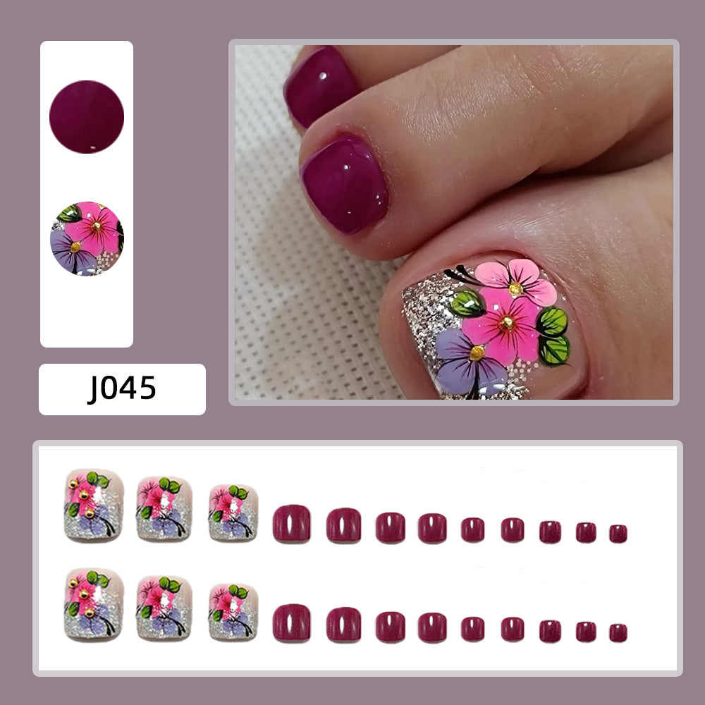 Kunstnägel mit Floralen Designs und Glitzereffekten Brehn