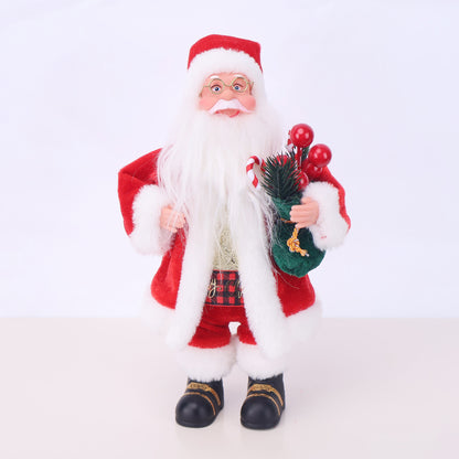 Dekorative Weihnachtsmannfigur mit Süßigkeit