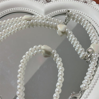 Eleganter Perlenbesetzter Brillenhalter Brehn