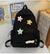 Niedlicher verspielter Rucksack mit Stern-Applikationen