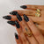 Künstlerisches mandelförmiges Press-On Nagelset mit Punkten Design Brehn