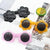 Damen Sonnenbrille im verspielten Blumenmuster Brehn