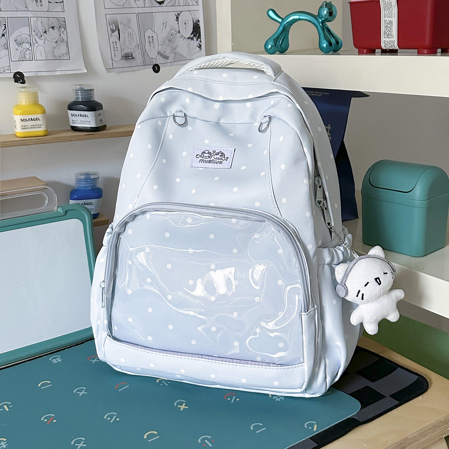Lustiger gepunkteter Schulrucksack