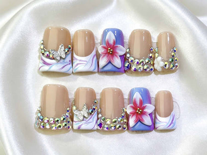Dekoratives florales Nagelkunstset mit Strassteinen