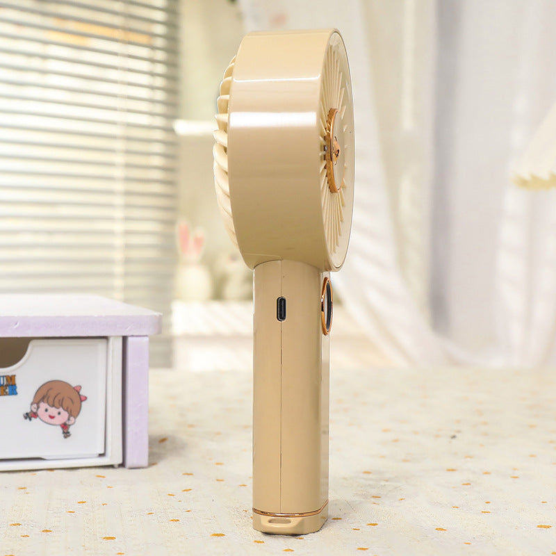 Frauen tragbarer Handventilator mit USB-Ladeoption und intuitivem Design Brehn