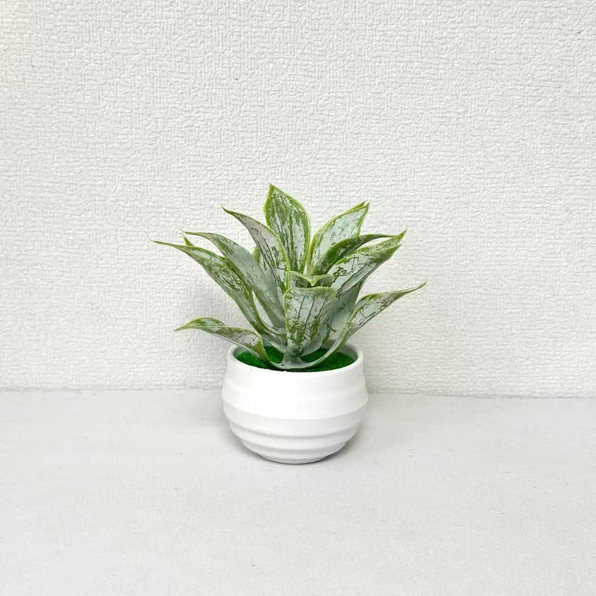 Künstliches Orchideen-Blumenarrangement für die Wohnraumausstellung