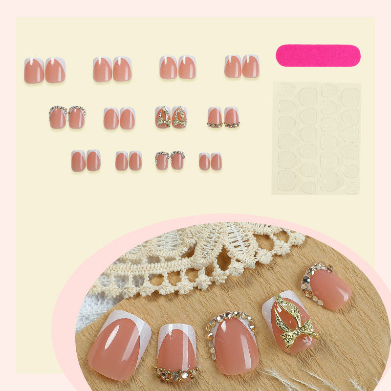 Kunstnagelset mit eleganten Glitzer- und Blumenverzierungen Brehn