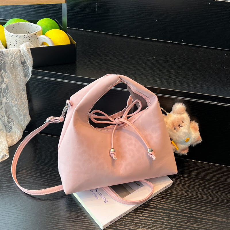 Stylische und funktionale Drawstring-Handtasche Brehn