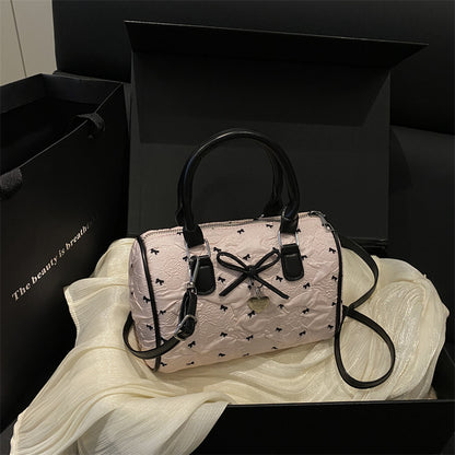 Bogen-verzierte Handtasche