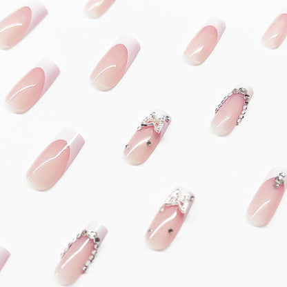 Kunstnagelset mit eleganten Strass- und Glitzerverzierungen Brehn