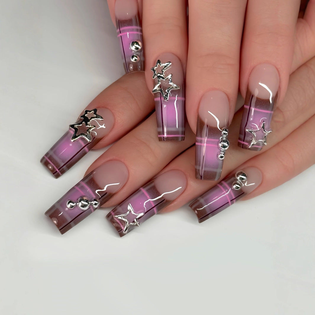 Künstlerische Stern-beschmückte Nagelkunst Brehn