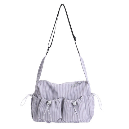 Lässige karierte Schultertasche